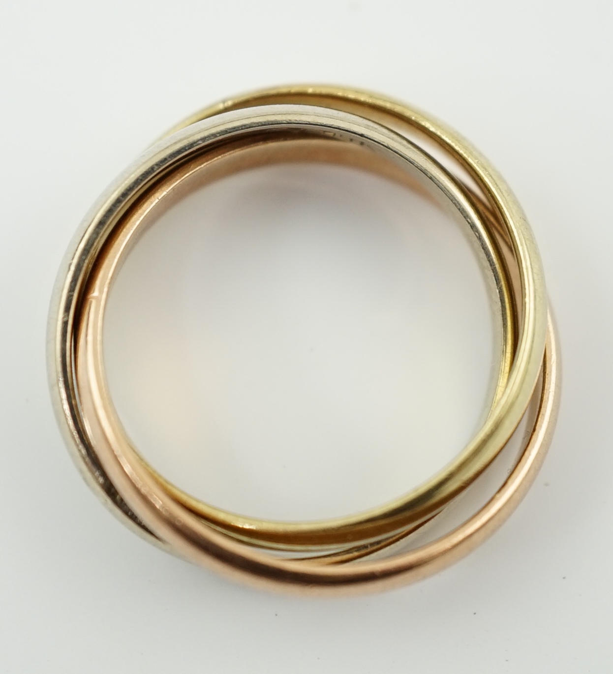 A modern three colour 14k gold 'Russian' wedding ring